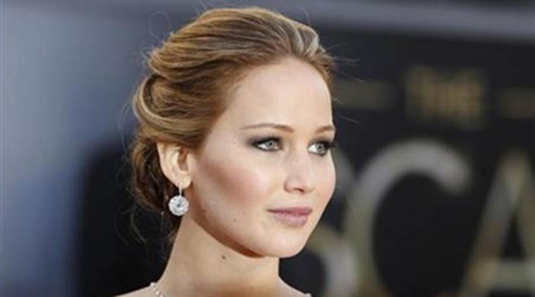 Jennifer Lawrence, best actress nominee for her role in the film "Silver Linings Playbook", arrives at the 85th Academy Awards in Hollywood, California February 24, 2013. REUTERS/Lucas Jackson